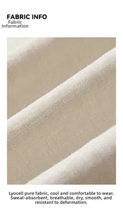 Macro shot of breathable Lyocell fabric texture with smooth drape and soft cream finish