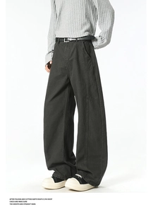 Detail of high-street wide-leg cargo pants featuring side stitching and a black slim belt