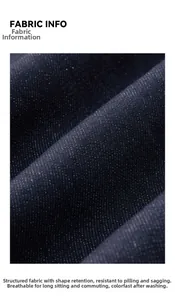 Détail du tissu denim bleu foncé montrant la texture nette et le tissage anti-boulochage