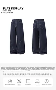 Jean large bleu foncé avec surpiqûres contrastées et instructions d'entretien