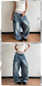 Close-up of vintage blue wash denim cargo pants with large side pockets and oversized cut