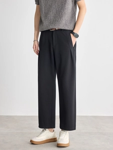 Men's minimalist black straight-leg trousers with premium textured draped fabric