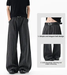 Detail view of men's striped wide-leg trousers with elegant belt and loose hem design