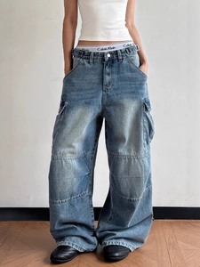 Vintage light blue baggy cargo jeans with multi-pocket design and street style fit