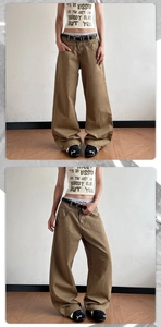 Detail of khaki wide-leg trousers with high waist design and black belt coordination