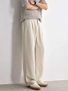 Men's loose Lyocell casual pants in light beige featuring textured fabric and relaxed fit