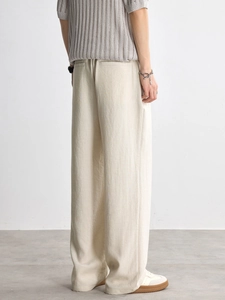 Loose fit Lyocell sports trousers for men and women with textured drape fabric