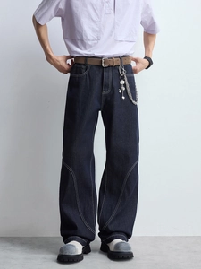 Jean ample bleu foncé pour homme avec surpiqûres contrastées blanches et empiècements