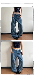 Close-up of vintage wash denim with high-waisted wide-leg cut and American street style