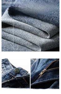 Détails du denim bleu délavé vintage avec fermeture éclair YKK et bouton métallique spécial