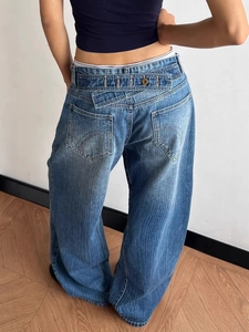 Retro straight leg wide jeans in dark blue wash featuring unique back buckle detail