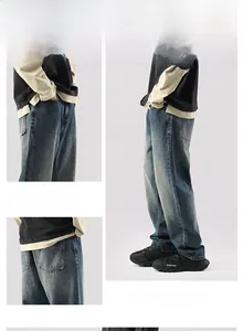 Détails du jean ample pour hommes en denim bleu délavé vintage avec vue sur les poches