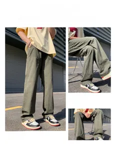 Detailed view of army green cotton cargo pants with reinforced stitching and straight fit