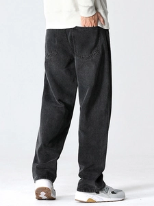 Men's loose straight-leg washed black denim jeans with a vintage distressed texture