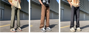 Detailed view of heavy cotton carpenter pants featuring reinforced knees and side utility loops