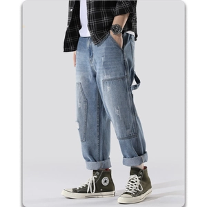 Men's light blue straight leg jeans with patchwork details and utility cargo pockets