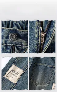 Detail of dark wash jeans showing metal buttons, YKK zipper and branded leather waist tag