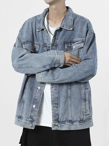 Retro light blue denim jacket with vintage wash, featuring classic collar and metal buttons