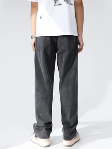 Men's relaxed fit washed grey denim jeans with a straight leg and vintage aesthetic