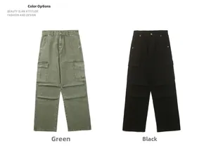 Detail view of cargo pants in green and black colors with large utility side pockets
