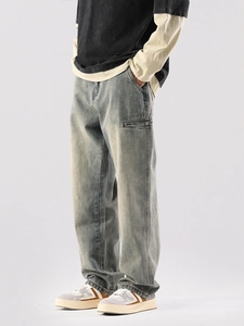 Jean bleu délavé vintage pour homme en coupe droite décontractée avec poches cargo