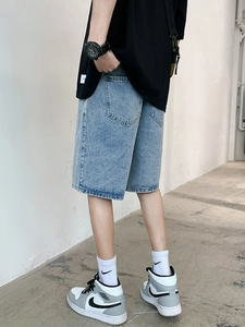 Loose fit light blue washed denim shorts with elastic waist for men and women
