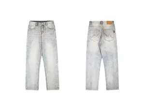 Front and back views of light blue washed denim jeans with embroidered back pocket detail