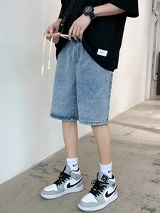 Loose light blue denim shorts with elastic drawstring waist for casual summer style