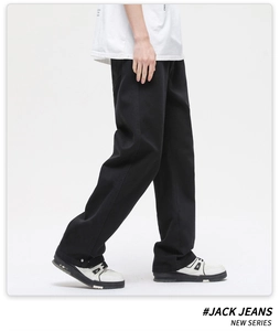 Side view of white wide-leg cotton denim jeans showing relaxed fit and clean drape