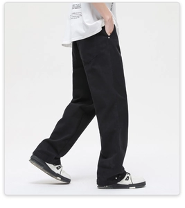 Rear view of loose white denim jeans showing wide-leg cut and standard back pockets