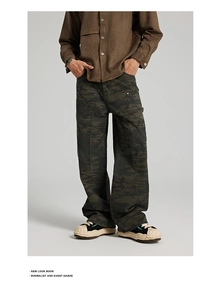 Detailed look of men's wide-leg woodland camo cargo pants with structured fabric texture