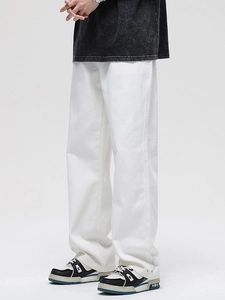 Men's minimalist white wide-leg cotton denim pants with loose straight fit and natural drape
