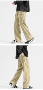 Side view of light khaki wide-leg casual pants featuring drawstring waist and large pockets