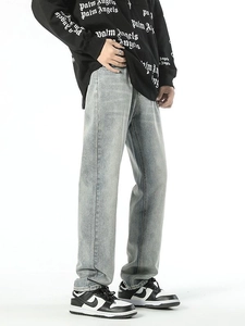 Men's light blue washed straight leg denim jeans with stylish pocket embroidery detail