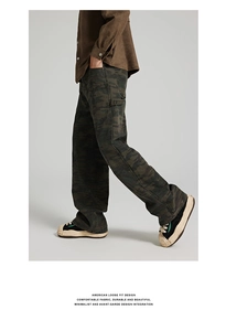 Detail of American loose fit camo cargo pants showing side pockets and draped fabric
