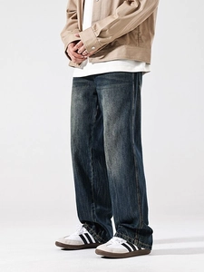 Slim fit dark blue denim jeans for men with vintage wash and straight leg design