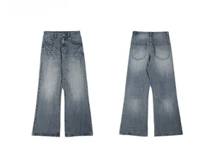 Front and back views of vintage wash flare jeans with lightning distressed fading effect