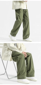 Relaxed fit army green straight-leg trousers with premium cotton fabric texture