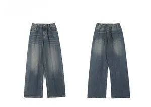 Front and back view of retro dark blue wide-leg denim jeans with elastic waist and wash