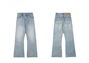 Front and back view of light blue washed flared jeans with premium leather waist patch