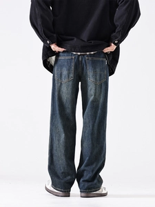 Men's retro wash loose straight leg jeans with deep blue vintage texture and back pocket detail