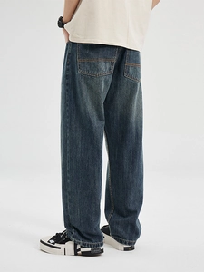 Retro loose fit wide leg denim jeans with vintage wash and classic back pocket design