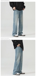 Detailed side view of light blue retro washed wide leg denim jeans with a vintage vibe
