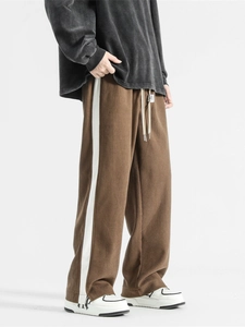 Men's vintage brown wide-leg sports trousers with white side stripes and drawstring waist