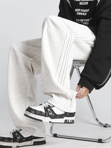 Unisex light gray wide leg sweatpants with stylish side stripes and a draped fit