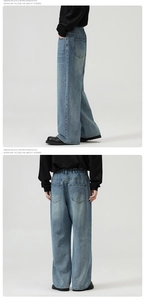 Detail view of American vintage loose straight denim jeans with elastic drawstring waist
