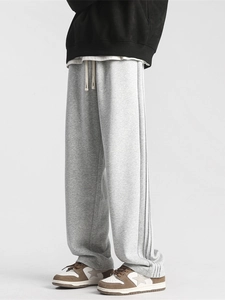 Loose fit light grey sweatpants with drawstring waist for unisex casual street style