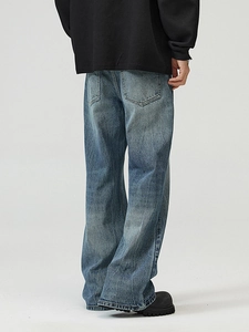 Retro washed blue flared jeans with vintage lightning crack design and loose fit for men
