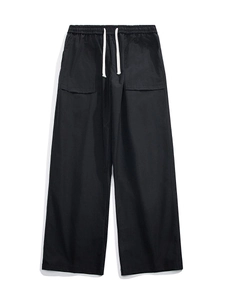 Japanese style black wide-leg trousers with elastic waist and large patch pockets