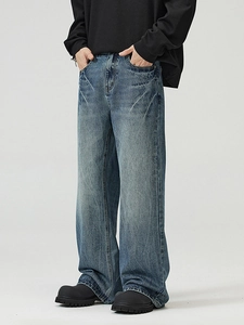 Men's vintage blue wash flared jeans with lightning crackle texture and loose fit
